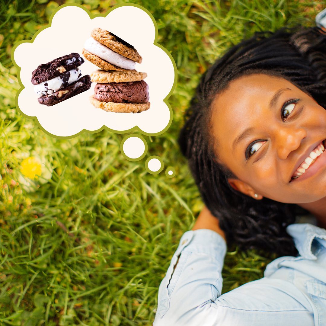 Woman lying on grass, daydreaming about Cool Jacks ice cream sandwiches.